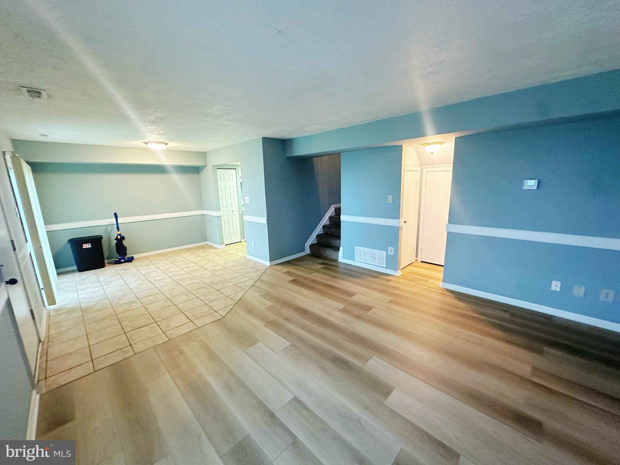 807 C Windstream Way, Unit 807C Edgewood, MD 21040 - Photo 7 of 11 a bedroom with a bed and wooden floor