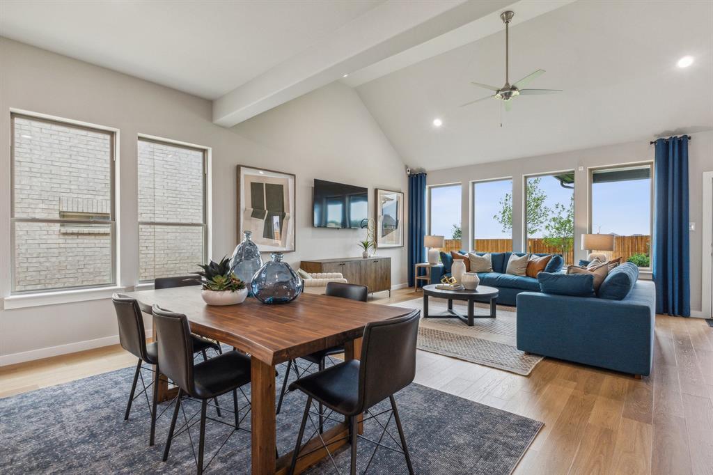 9517 Rattlesnake Trail Crowley, TX 76036 - Photo 31 of 32 a view of a dining room with furniture window and wooden floor
