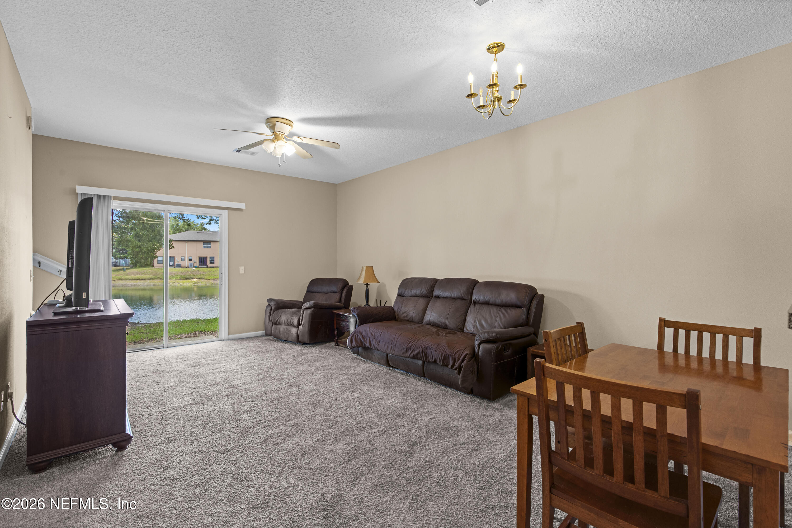 7774 Melvin Road Jacksonville, FL 32210 - Photo 3 of 32 02 Living Room
