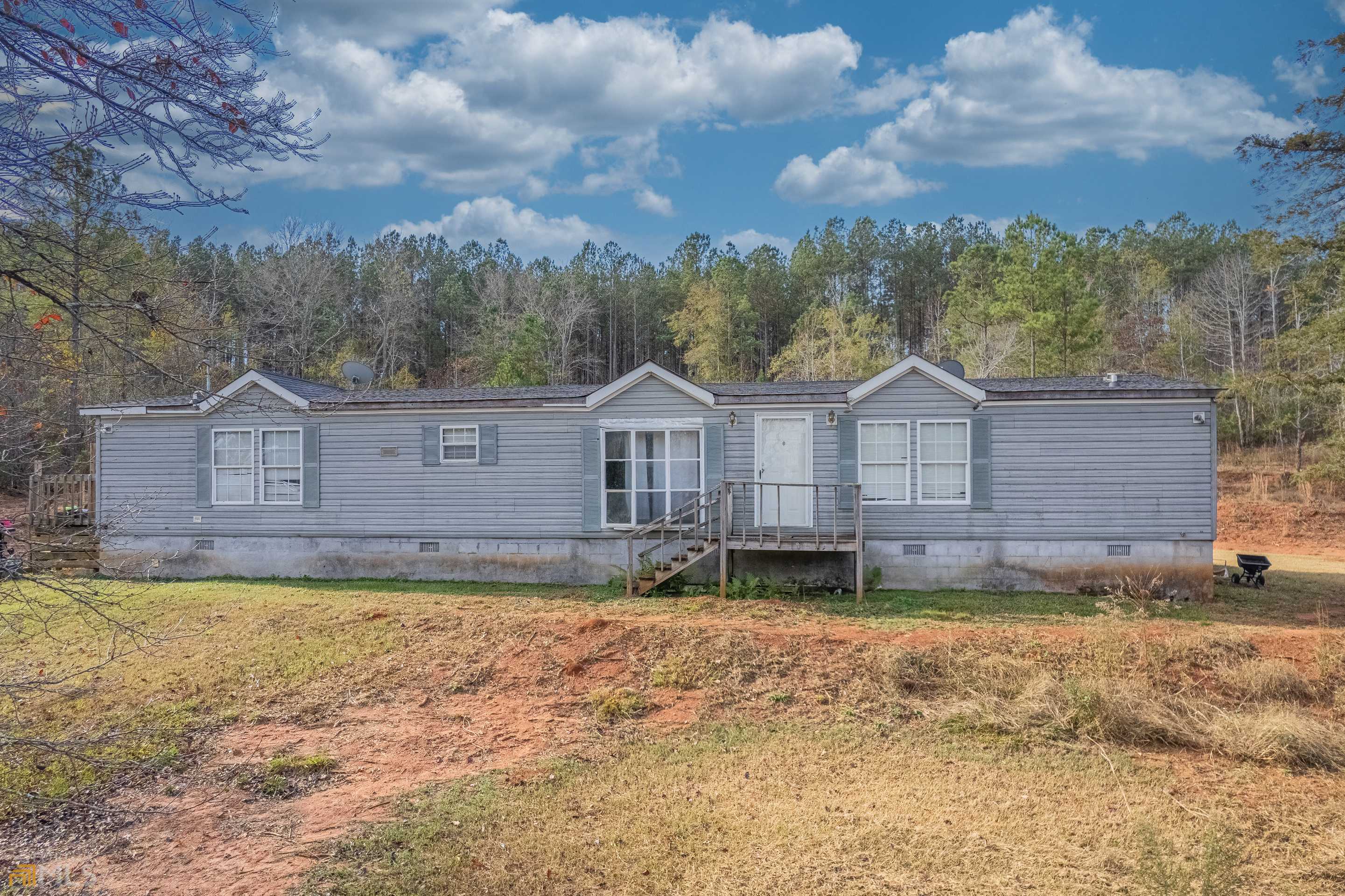 2021 Mallard Ridge Road Madison, GA 30650 - Photo 1 of 1 a view of a house with a big yard