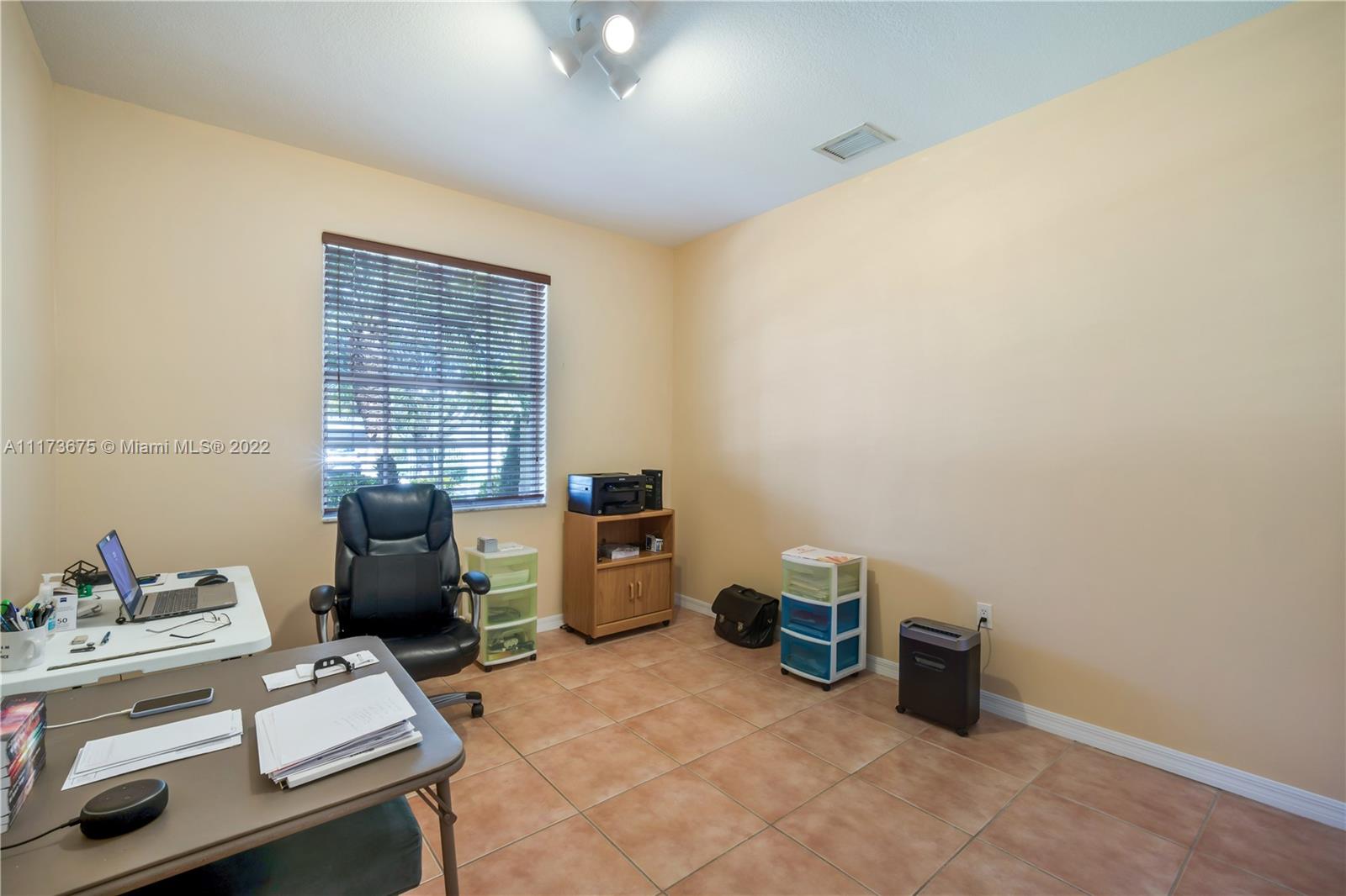 16234 Southwest 48th Terrace Miami, FL 33185 - Photo 22 of 45 a view of workspace with furniture
