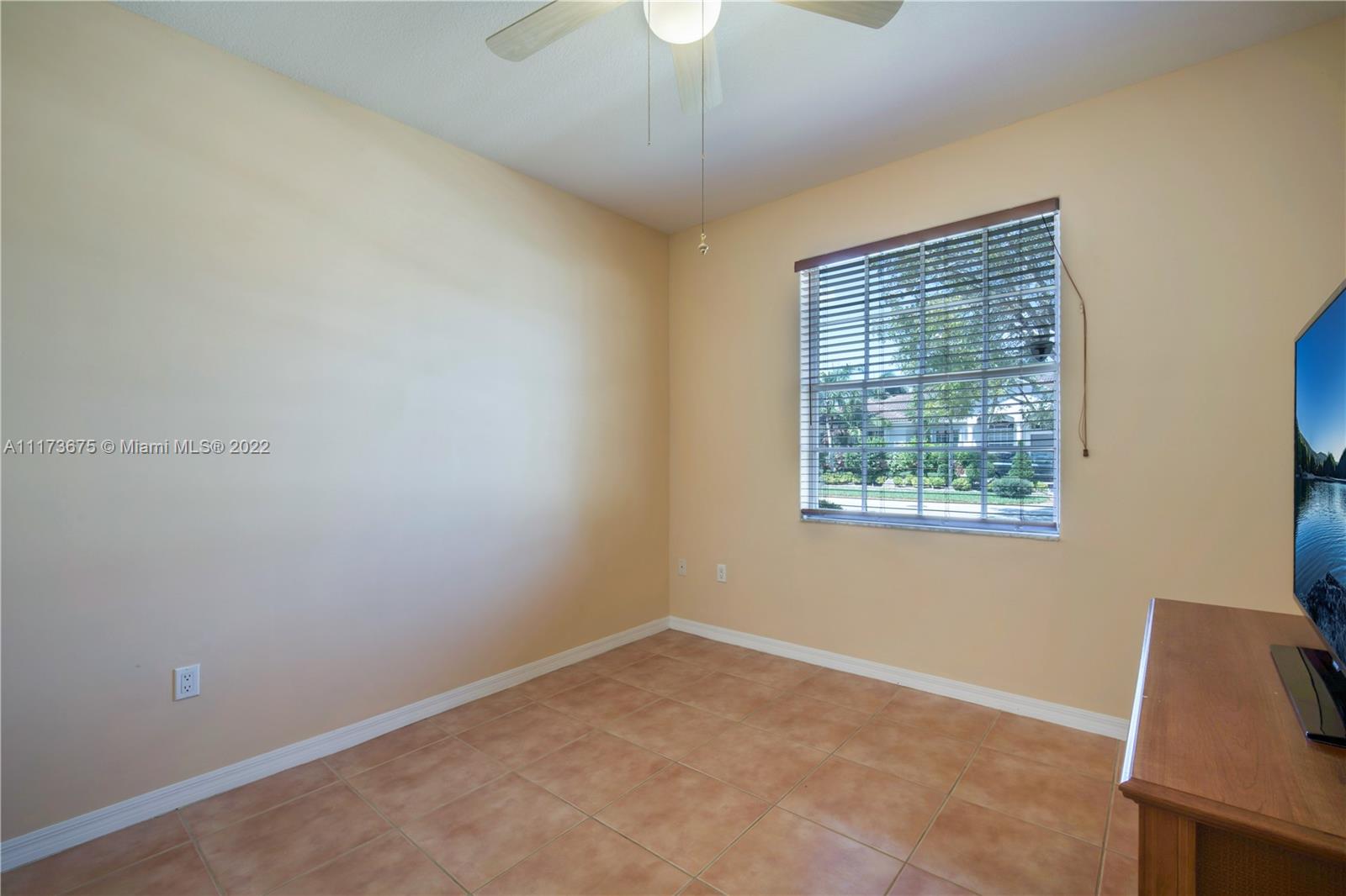 16234 Southwest 48th Terrace Miami, FL 33185 - Photo 28 of 45 a view of an empty room with a window