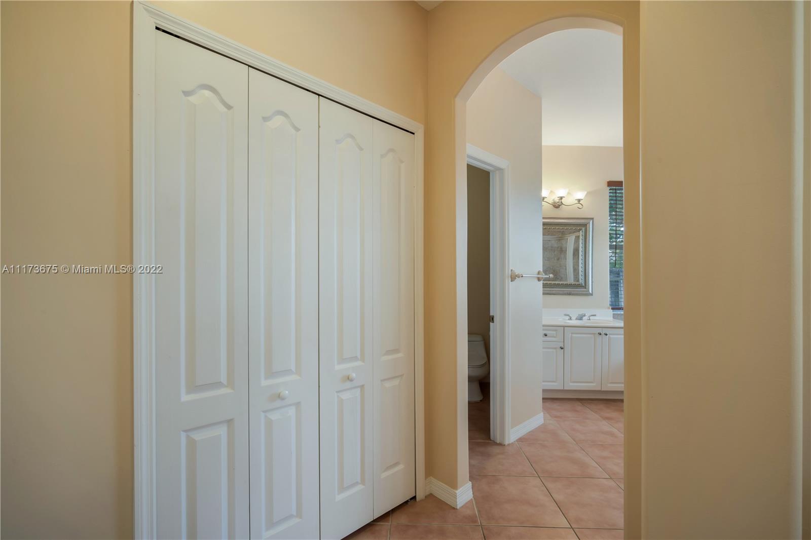 16234 Southwest 48th Terrace Miami, FL 33185 - Photo 33 of 45 a bathroom with a shower and a sink