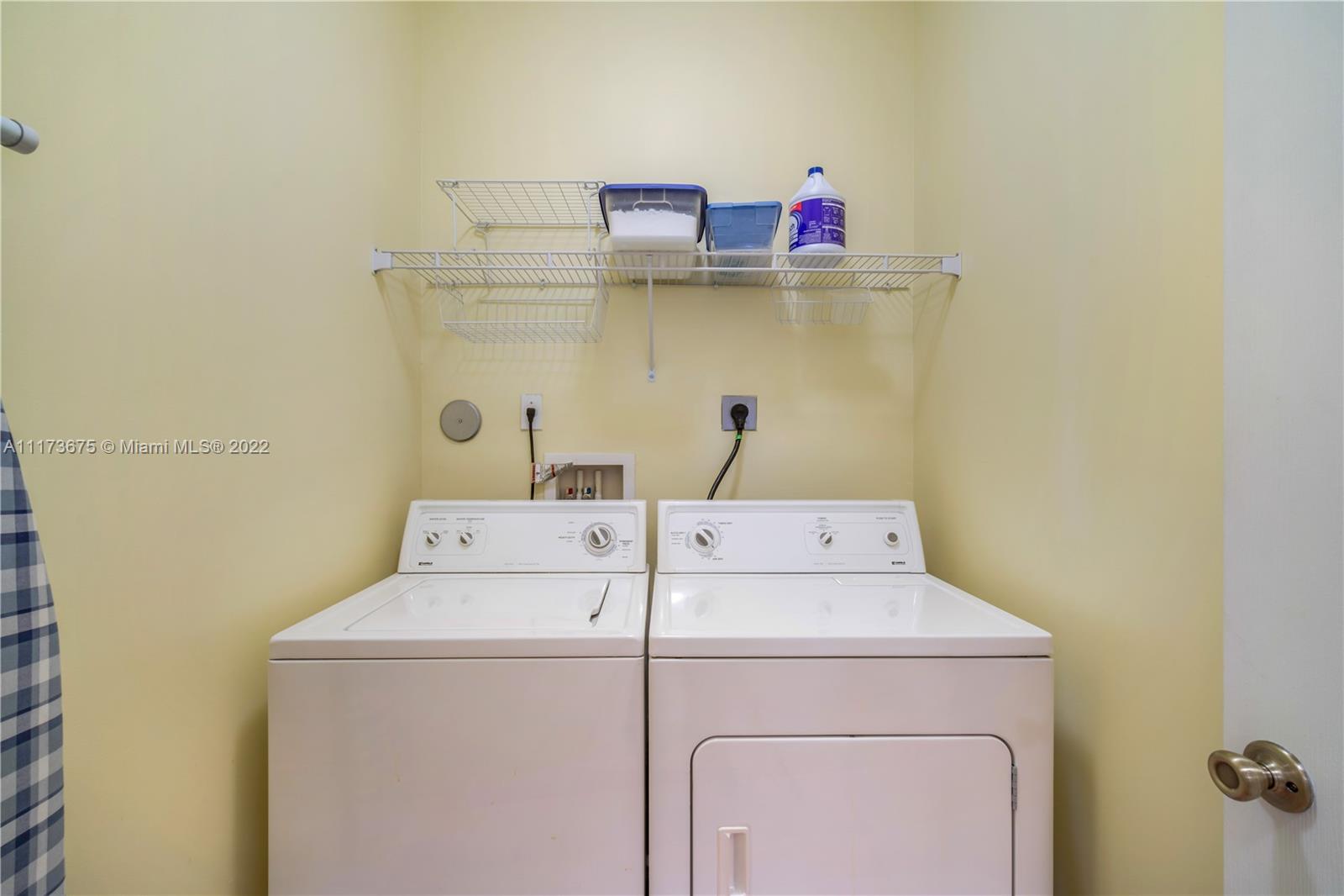 16234 Southwest 48th Terrace Miami, FL 33185 - Photo 37 of 45 a utility room with dryer and washer