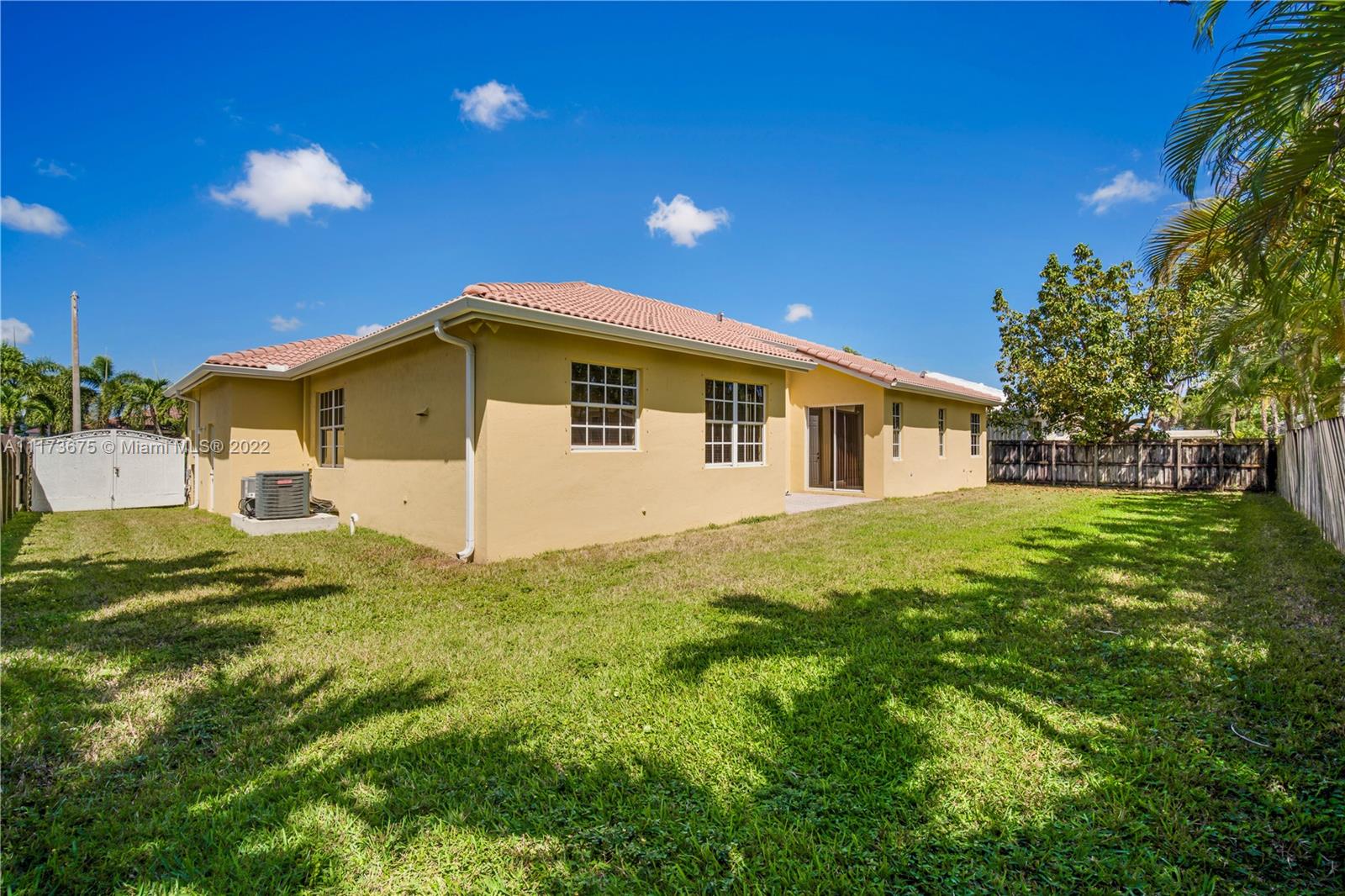 16234 Southwest 48th Terrace Miami, FL 33185 - Photo 40 of 45 a view of a house with a yard