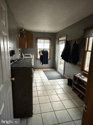 72 Quigley Road Newburg, PA 17240 - Photo 18 of 33 a living room with patio furniture and a flat screen tv