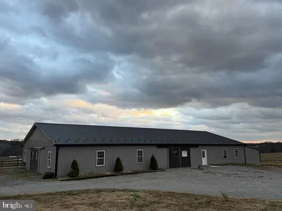 a front view of a house with garage