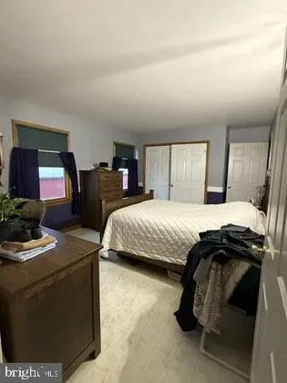 a living room with a couch and a flat screen tv