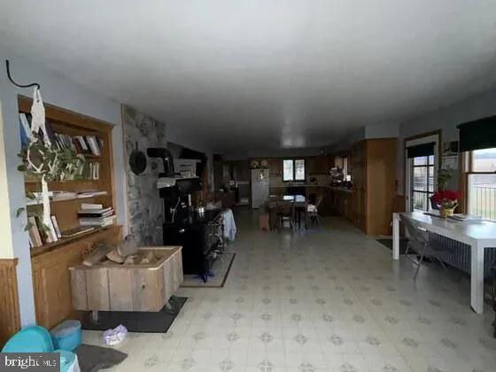 a bedroom with bed and window