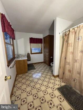 72 Quigley Road Newburg, PA 17240 - Photo 28 of 33 a living room with a couch and a flat screen tv