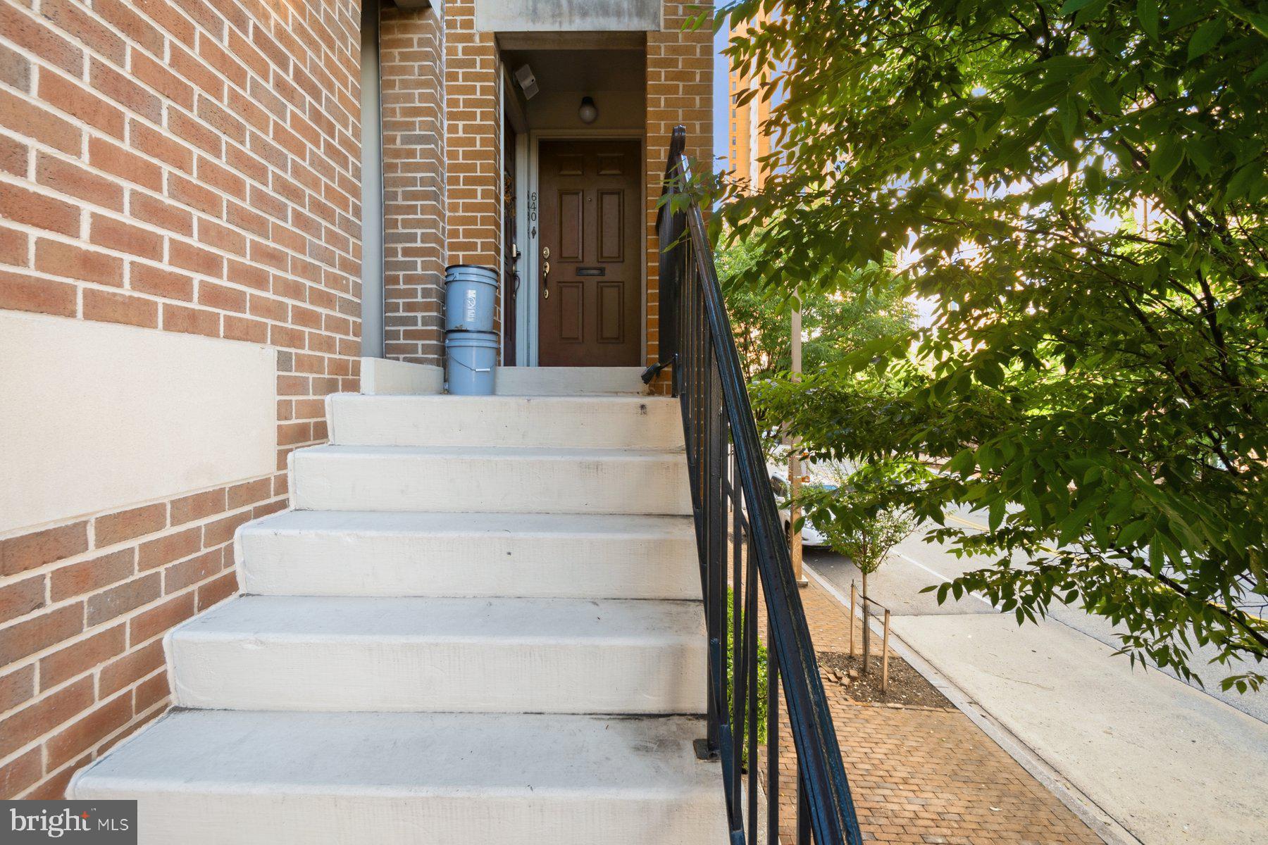 642 South Charles Street, Unit R 22 Baltimore, MD 21230 - Photo 2 of 26 a view of staircase with white walls and a potted plant