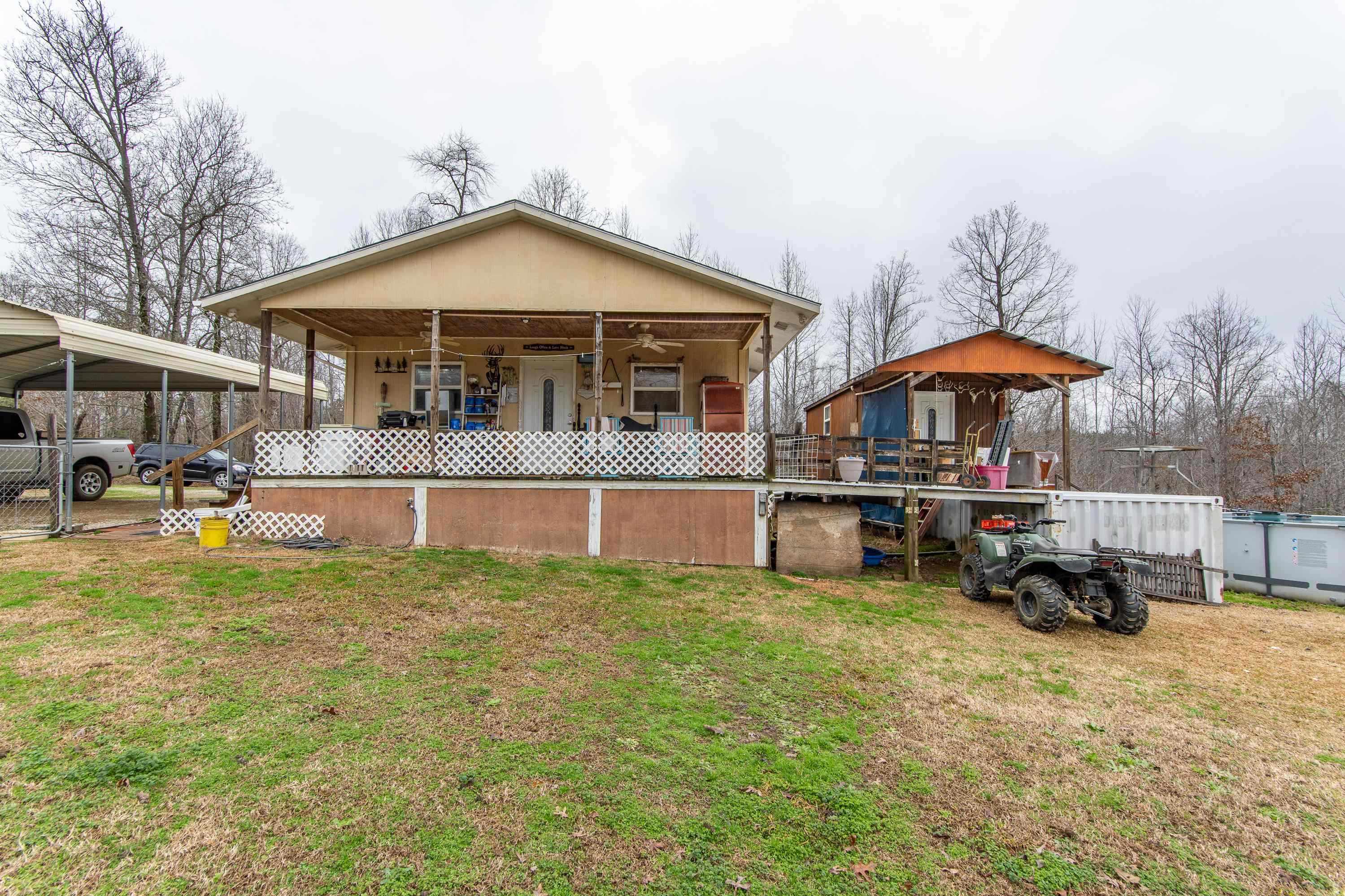 2040 Liberty Road Morris Chapel, TN 38361 - Photo 23 of 40 a view of a house with swimming pool and sitting area
