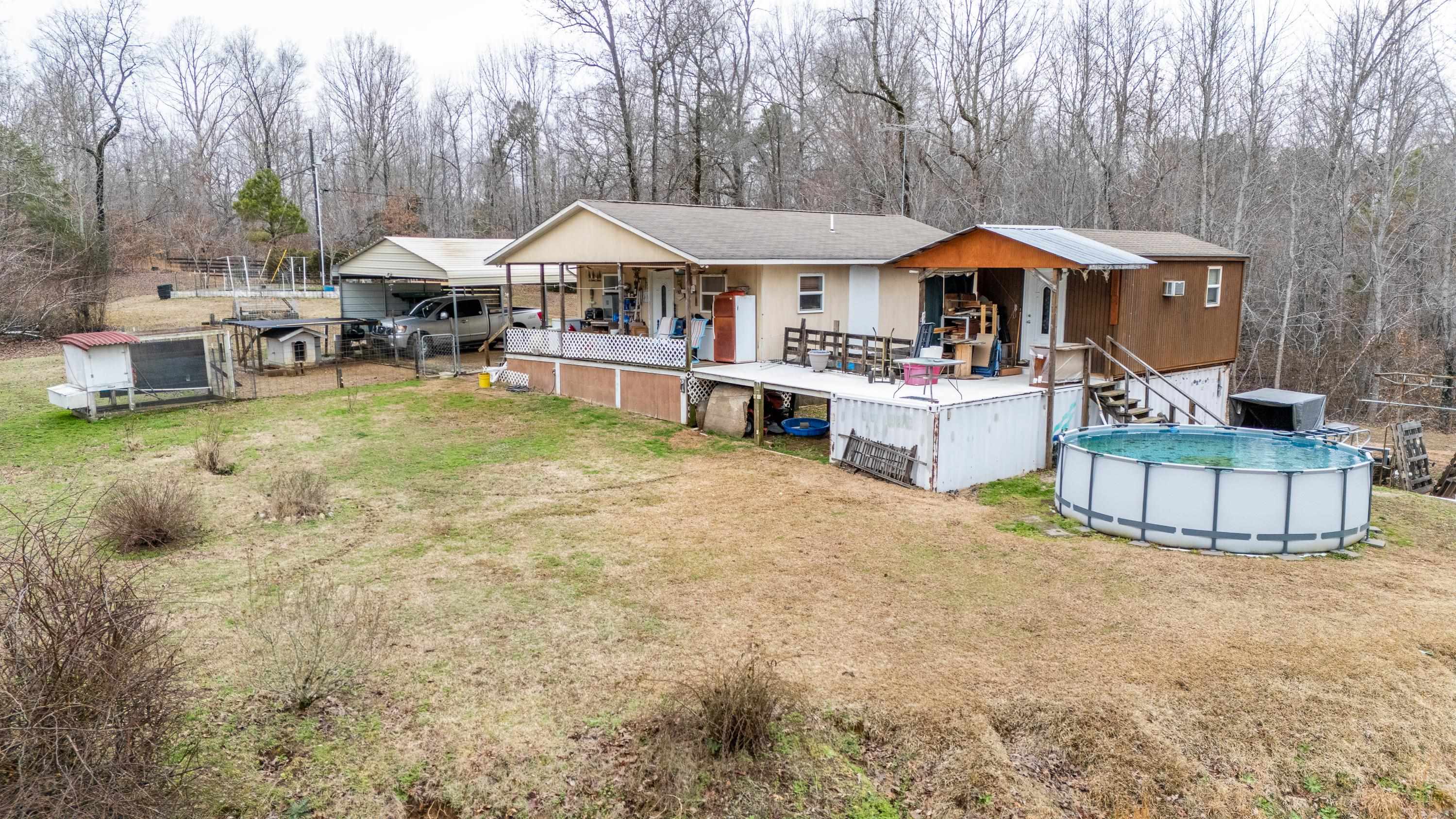 2040 Liberty Road Morris Chapel, TN 38361 - Photo 24 of 40 a front view of a house with garden