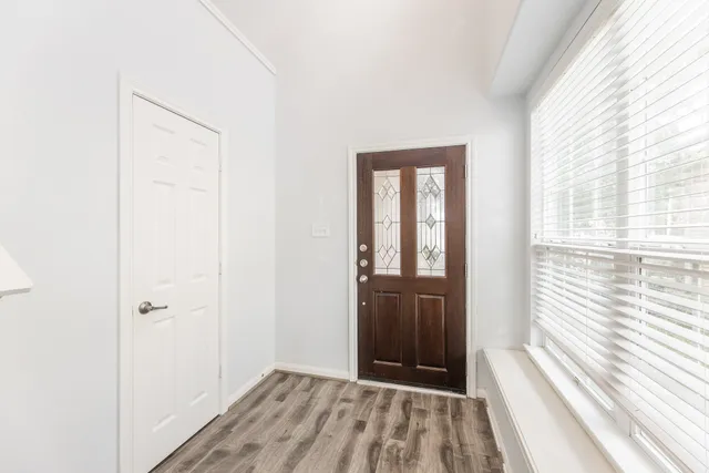 a view of a room that has a window in it