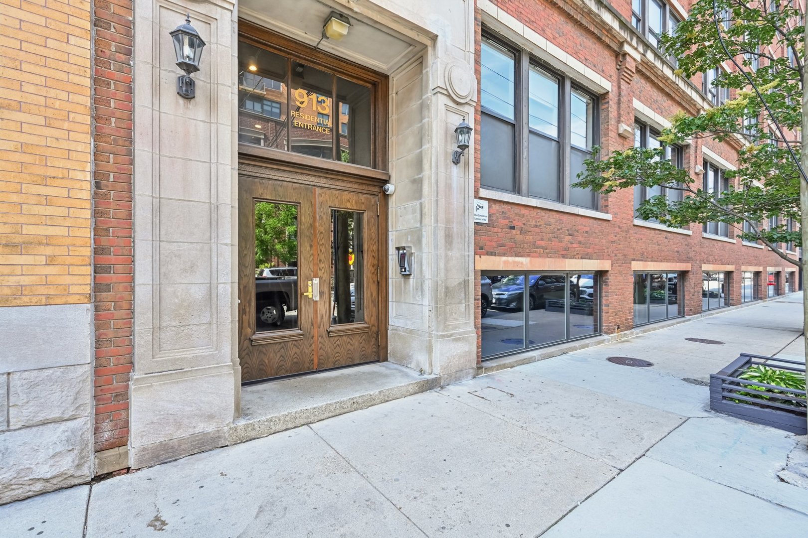 913 West Van Buren Street, Unit 5H Chicago, IL 60607 - Photo 3 of 23 a view of a brick building with a entrance