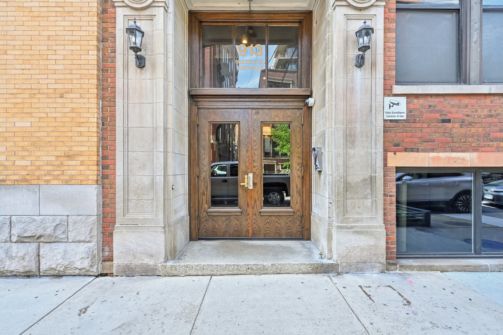 913 West Van Buren Street, Unit 5H Chicago, IL 60607 - Photo 4 of 23 a view of entrance front of a building