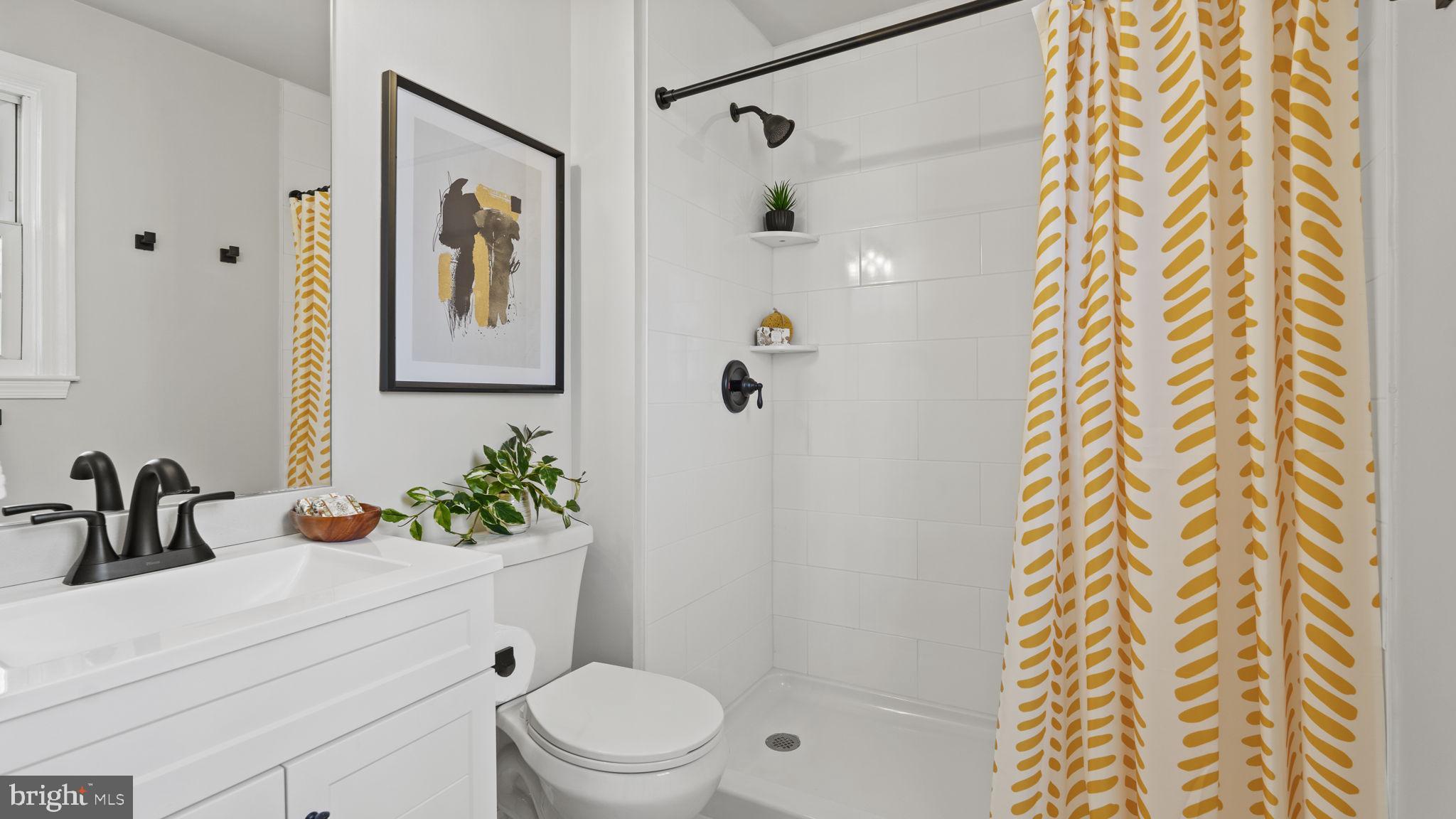 Bathrooms w/new tile and fixtures!
