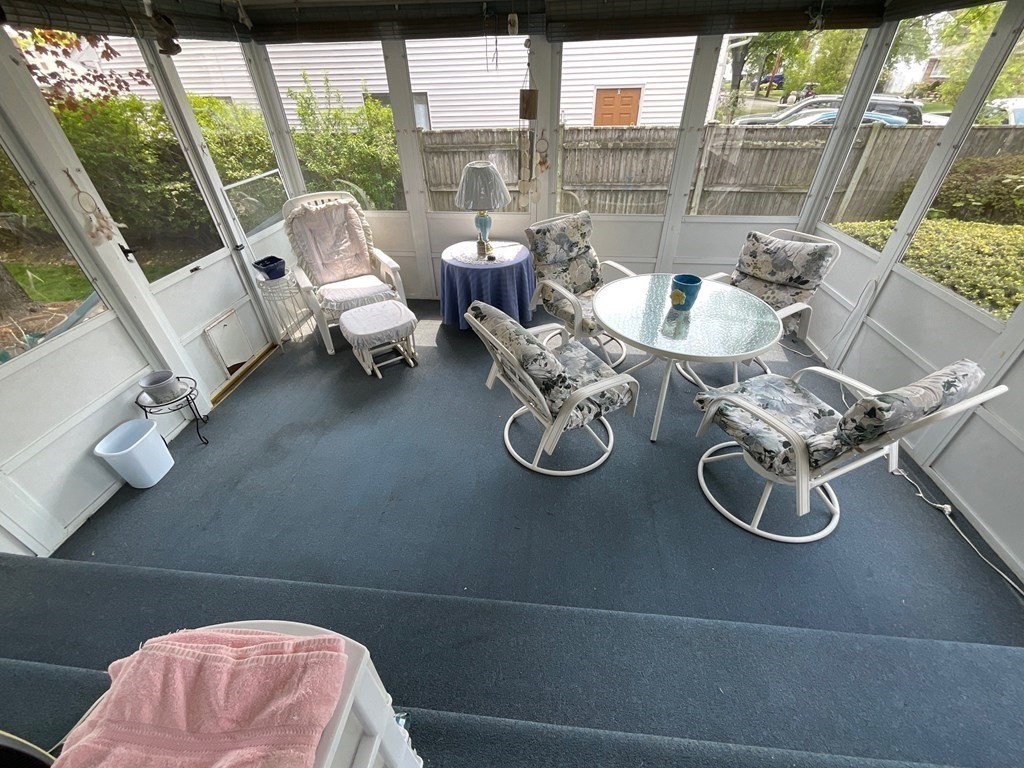 40 Anthony Road Newton, MA 02460 - Photo 5 of 22 a dining room with furniture and a floor to ceiling window
