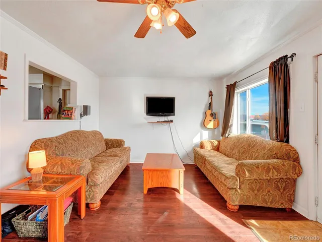 a living room with furniture and a couch