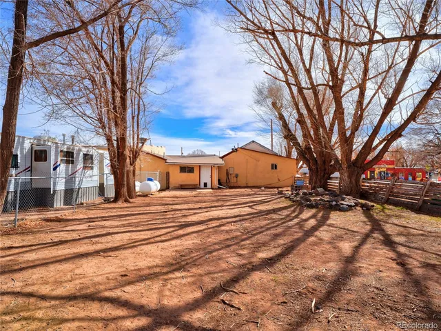 a view of city street with houses