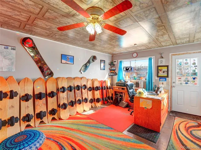 a view of an entryway with wooden floor