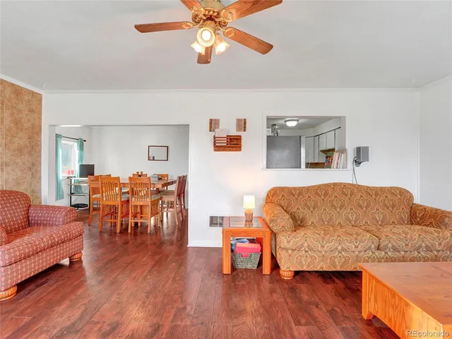 a living room with a couch and a flat screen tv