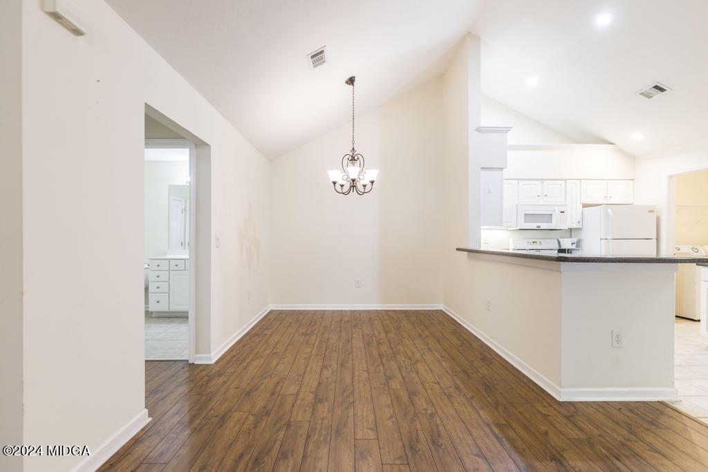 303 Cottage Lane Macon, GA 31210 - Photo 12 of 29 a view of empty room with wooden floor