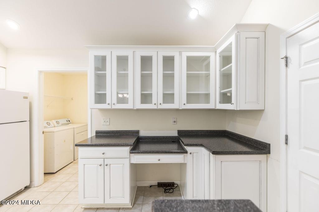 303 Cottage Lane Macon, GA 31210 - Photo 14 of 29 a kitchen with a sink and a refrigerator
