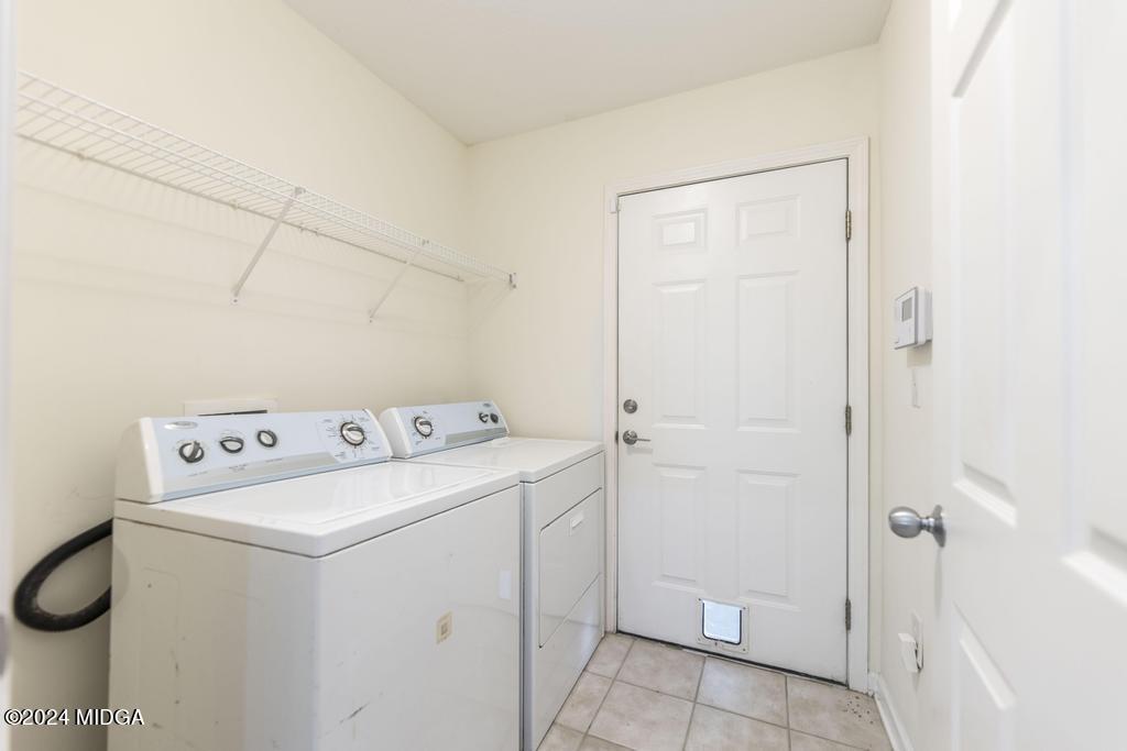 303 Cottage Lane Macon, GA 31210 - Photo 18 of 29 a utility room with dryer and washer