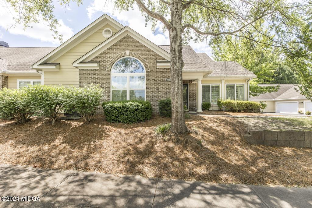 303 Cottage Lane Macon, GA 31210 - Photo 3 of 29 a front view of a house with garden