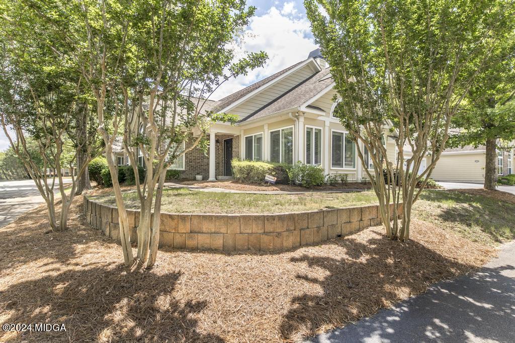 303 Cottage Lane Macon, GA 31210 - Photo 4 of 29 a front view of a house with a yard
