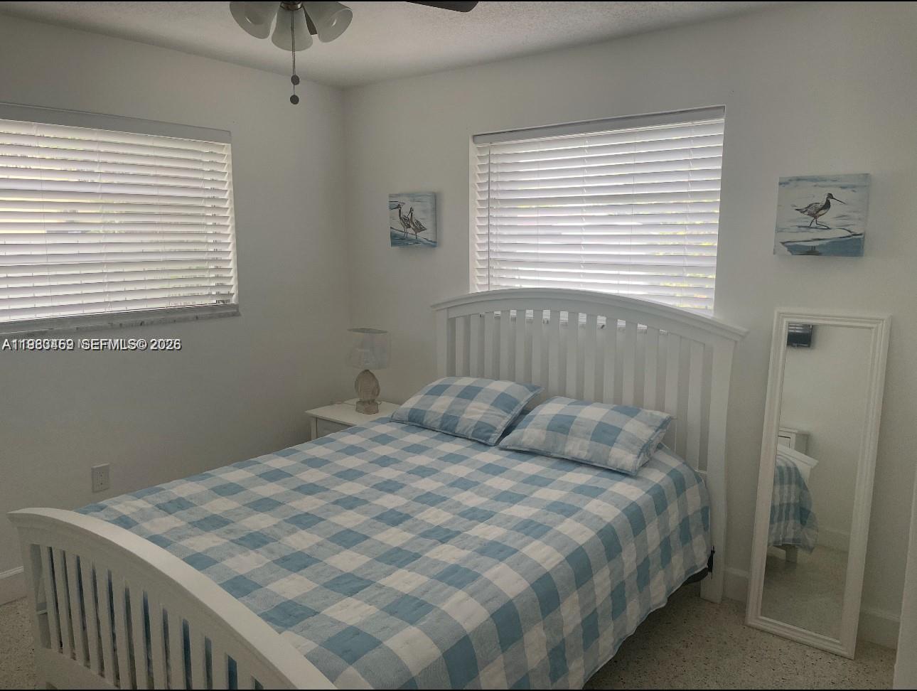 38 Silver Springs Drive Key Largo, FL 33037 - Photo 6 of 8 a bedroom with a bed and a window