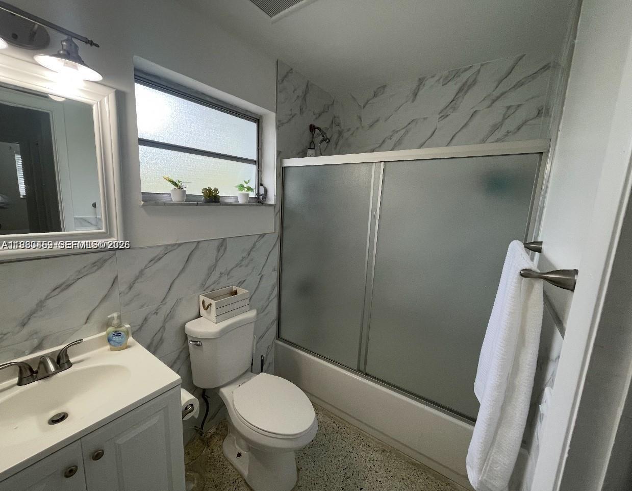 38 Silver Springs Drive Key Largo, FL 33037 - Photo 8 of 8 a bathroom with a sink toilet and shower