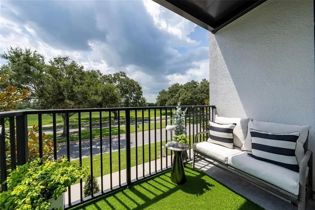 an aerial view of a house having outdoor space patio and lake view