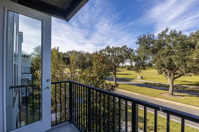 a view of a balcony with an outdoor space