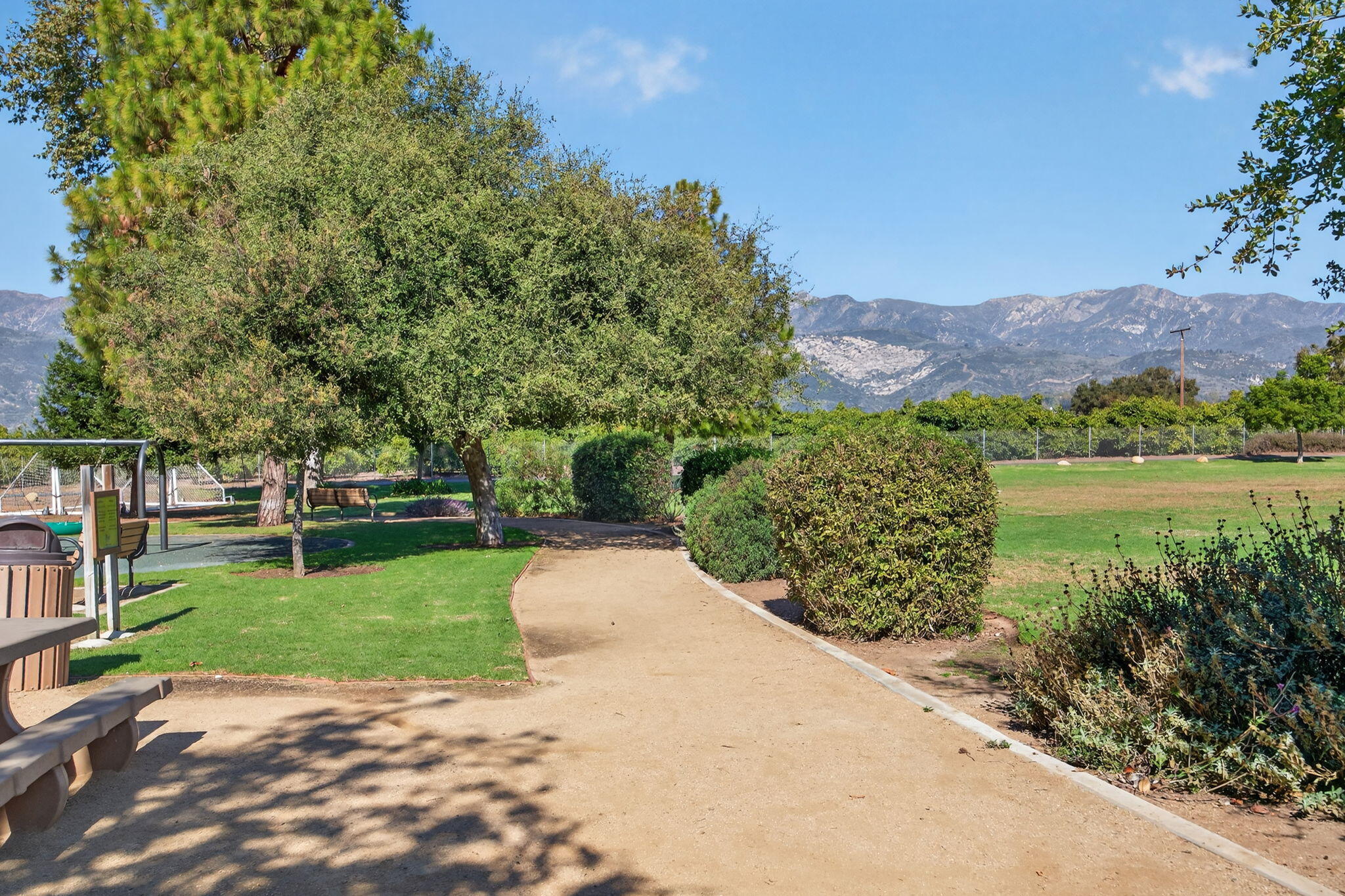 5976 Birch Street, Unit 2 Carpinteria, CA 93013 - Photo 24 of 39 a view of a garden with a lake view