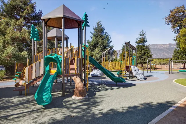 a bedroom with a bed and a night lamp
