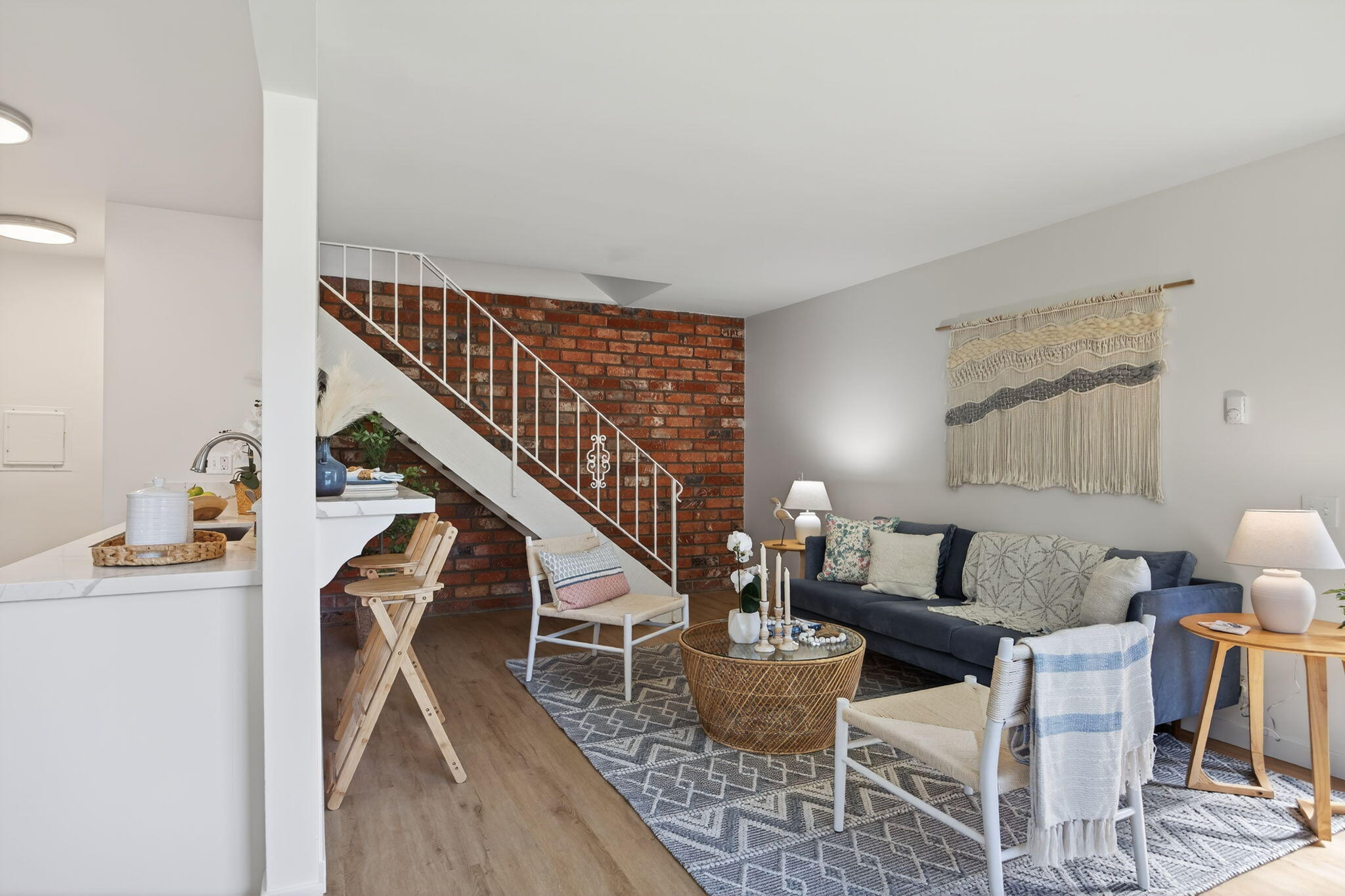 5976 Birch Street, Unit 2 Carpinteria, CA 93013 - Photo 30 of 39 a living room with furniture and a dining table