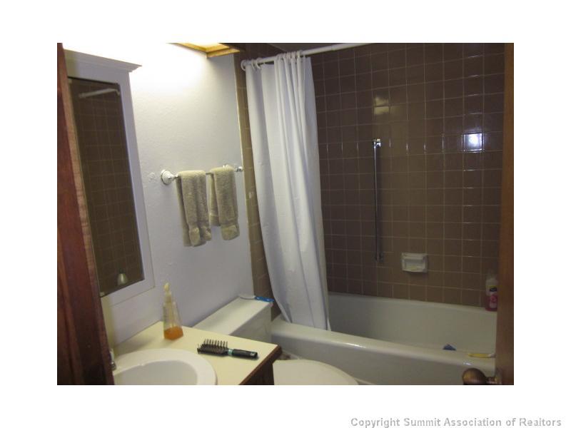 800 Copper Road, Unit 176 Copper Mountain, CO 80443 - Photo 8 of 20 a bathroom with a sink and a shower