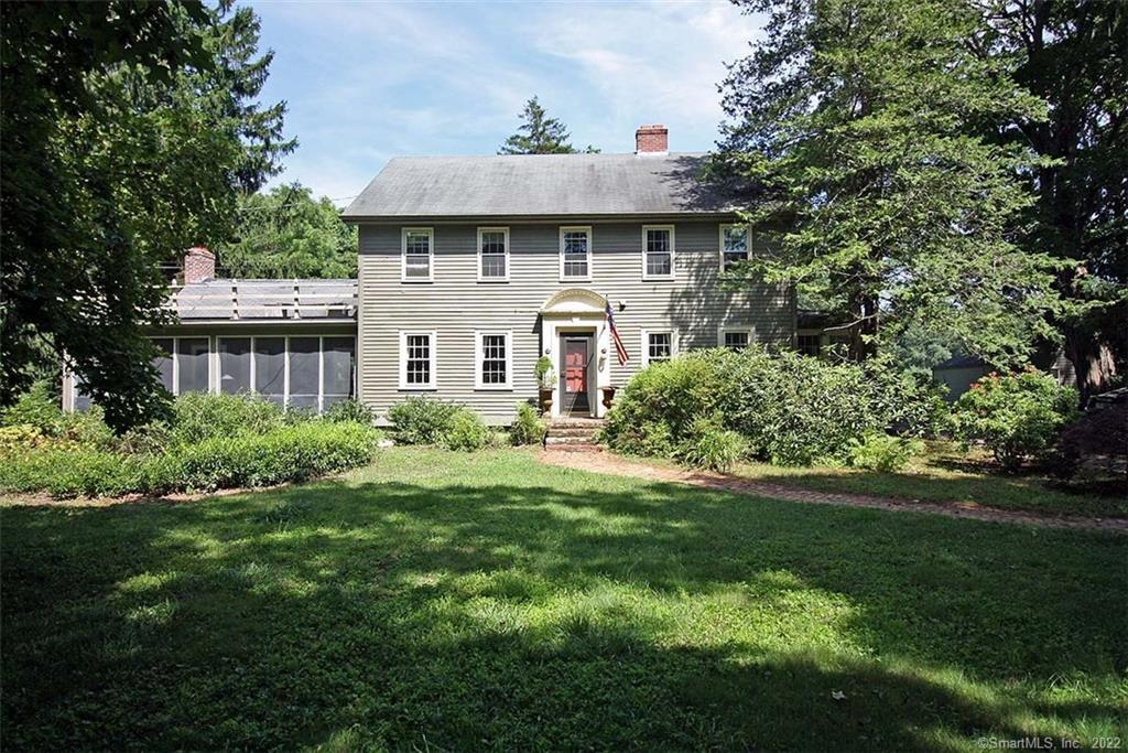 111 Boston Post Road Old Lyme, CT 06371 - Photo 1 of 1 a front view of a house with a yard