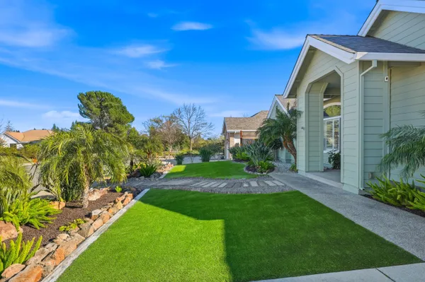 a view of a back yard of the house