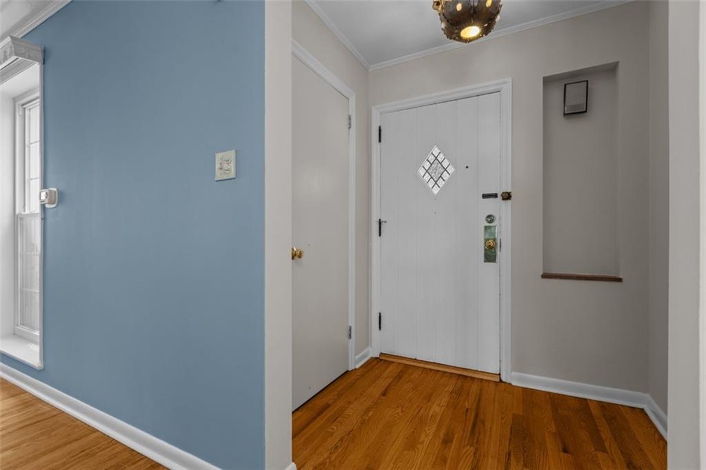 The entry foyer has a convenient coat closet.