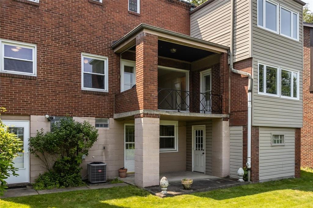 2727 Mt Royal Road Pittsburgh, PA 15217 - Photo 28 of 33 The balcony on the main floor, and patio on the lower level. To the far right is an enclosed shed.