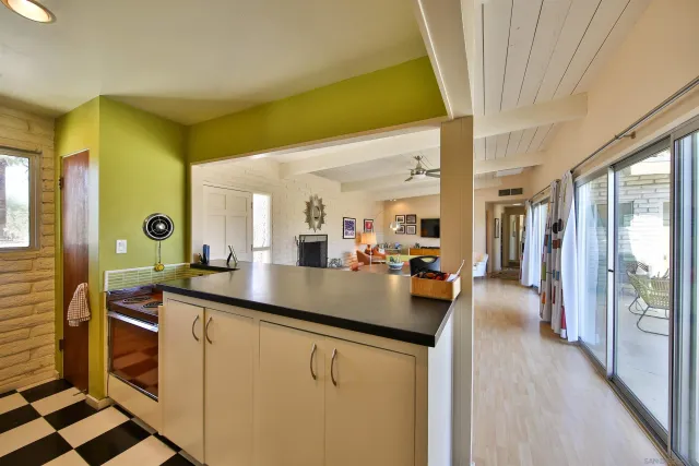 a view of a living room and a sink