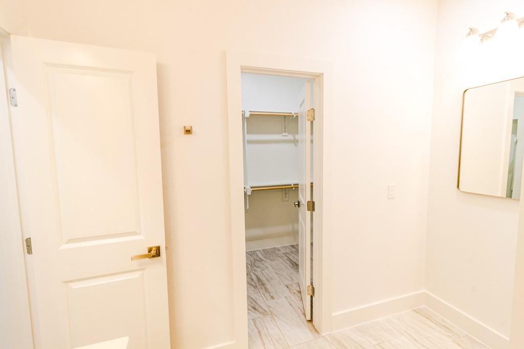 540 Highview Court Godley, TX 76044 - Photo 11 of 23 a bathroom with a glass shower door