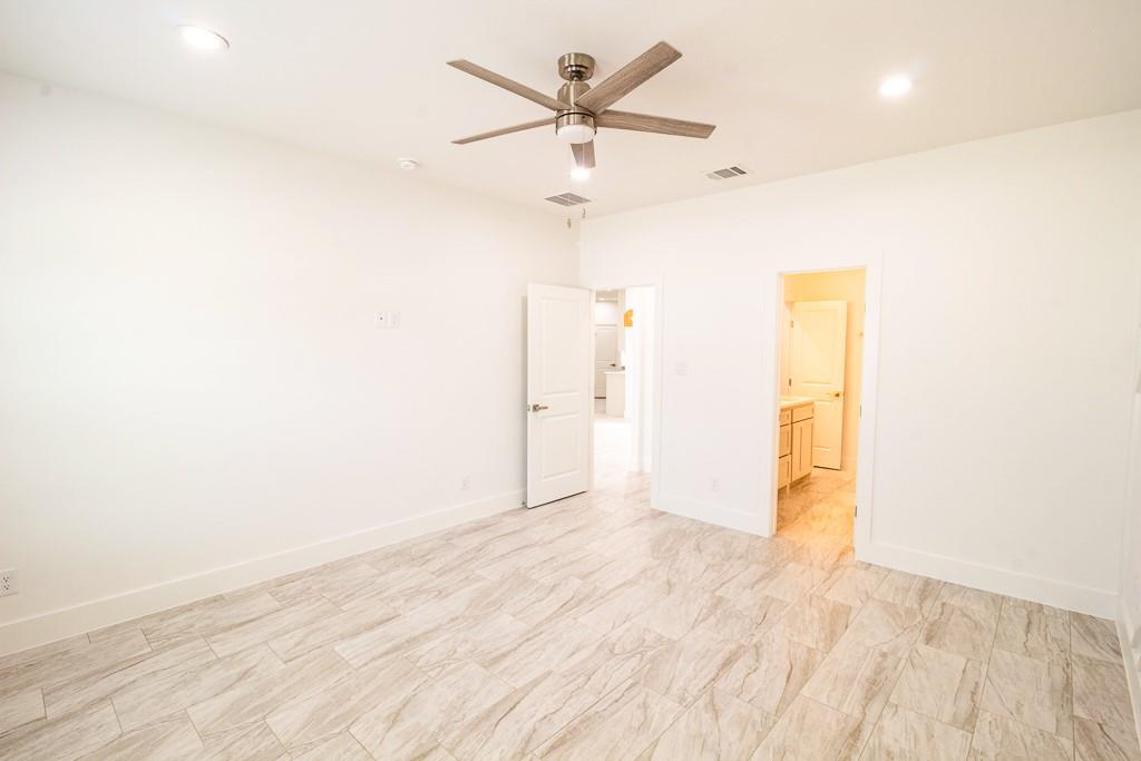 540 Highview Court Godley, TX 76044 - Photo 8 of 23 a view of a livingroom with a chandelier fan and a window