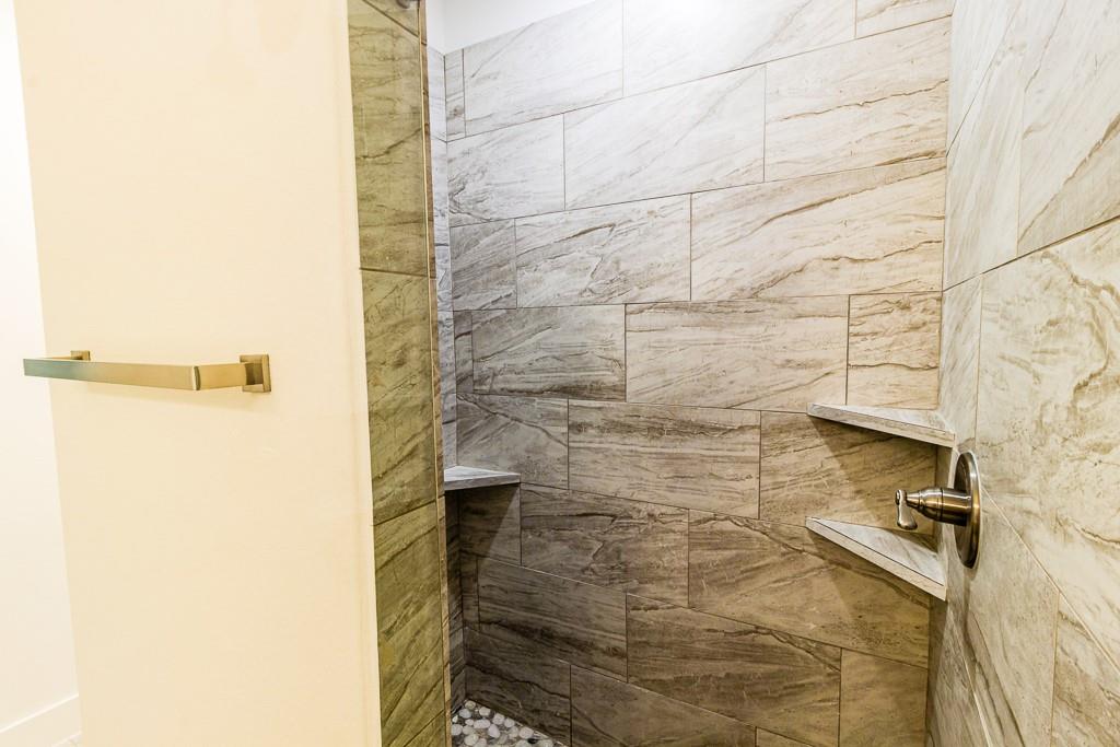 540 Highview Court Godley, TX 76044 - Photo 10 of 23 a bathroom with a shower