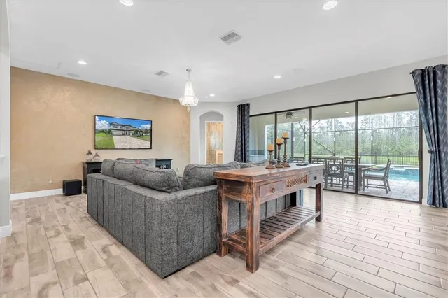 a bathroom with a sink a toilet and a shower