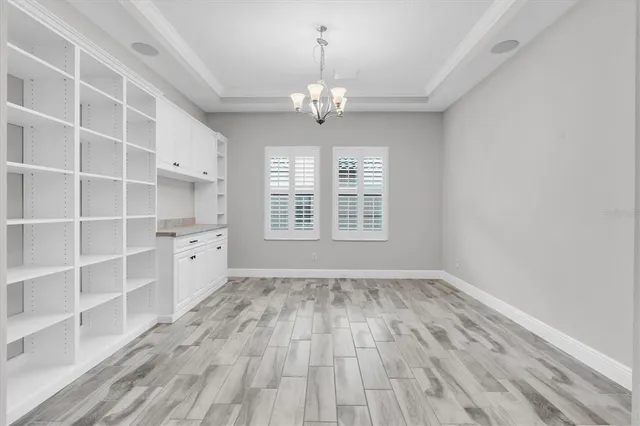 a view of a room with a flat screen tv