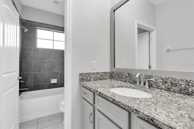 a view of a living room and hall with wooden floor